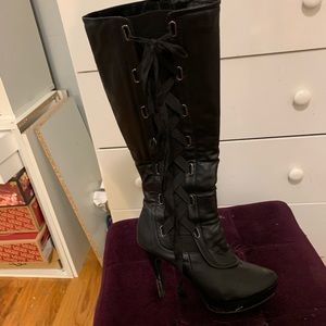 Knee high heeled boots